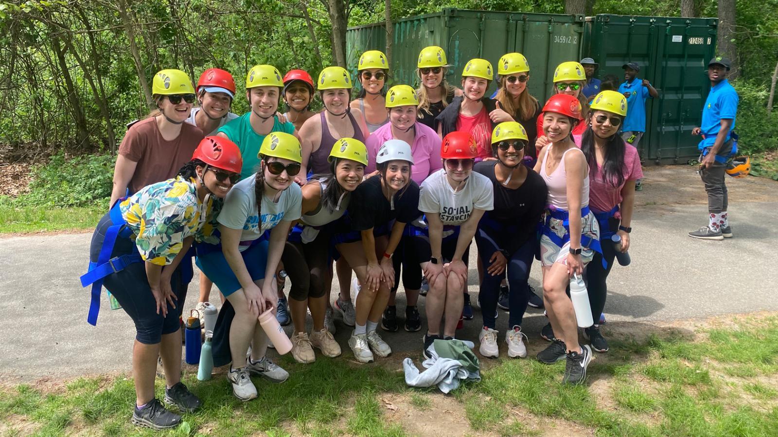 Residents getting ready to participating in a ropes course in 2023