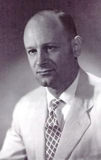 Black and white photo of Paul Di Santagnese.